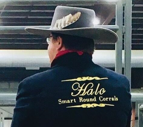 Rear view of man with a gray cowboy hat and an embroidered jacket